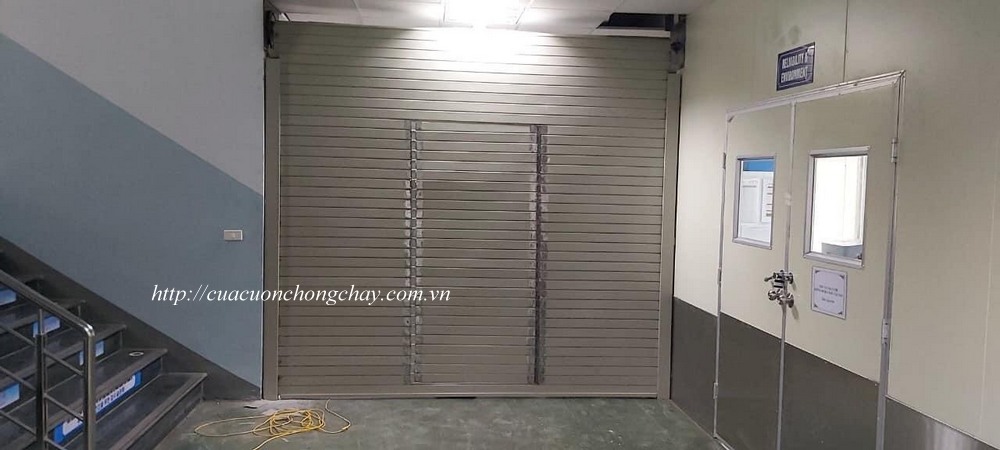 Cửa sập ngăn cháy có cửa phụ, Fire shutter door korea