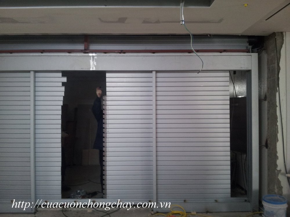 Cửa sập ngăn cháy có cửa phụ, Fire shutter door korea