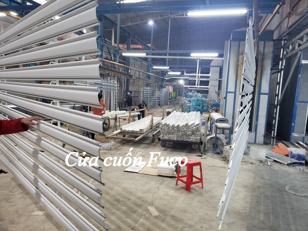 Cửa sập ngăn cháy có cửa phụ, Fire shutter door korea, cửa cuốn ngăn cháy