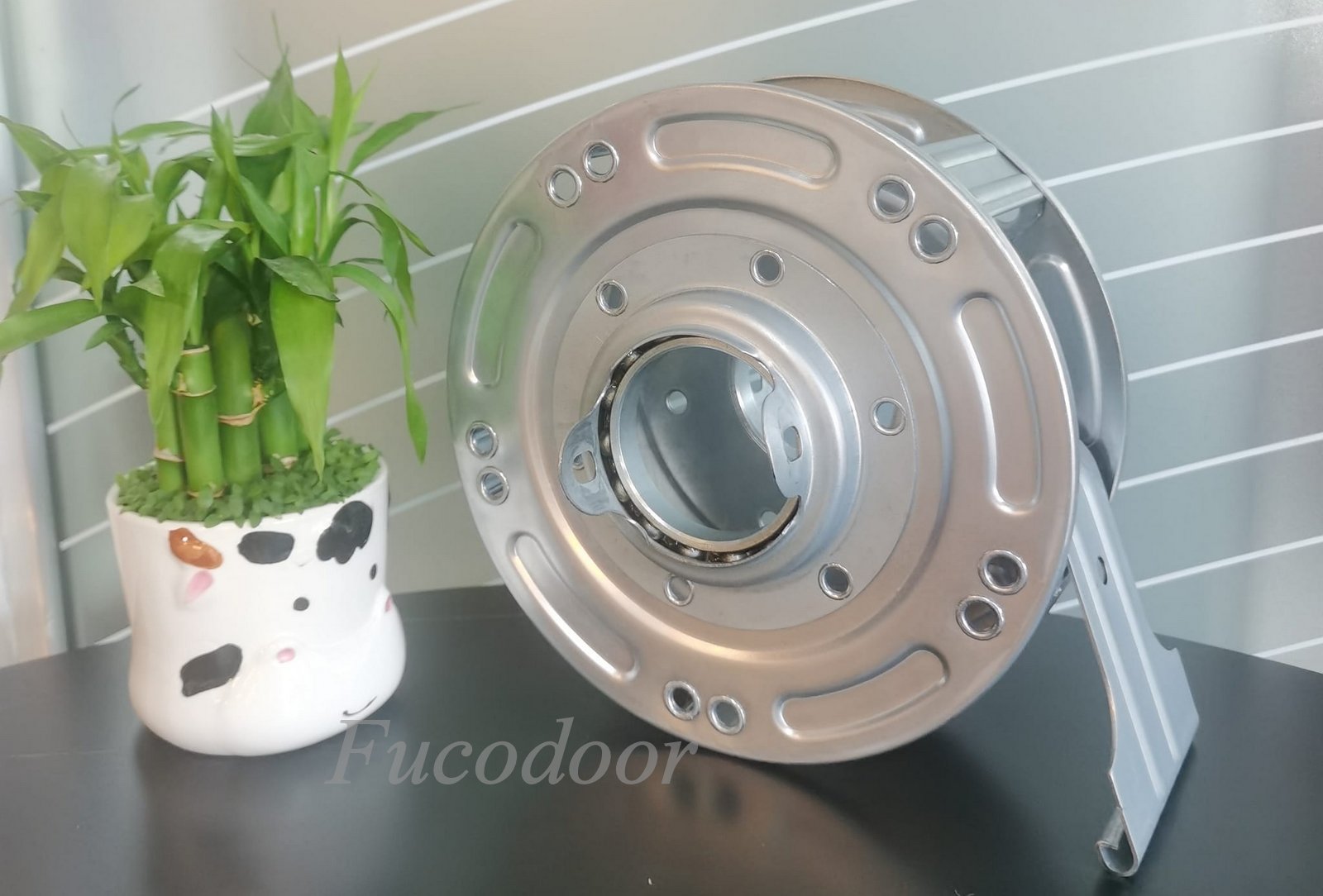 lò xo cửa cuốn lò xo kéo tay cót lá