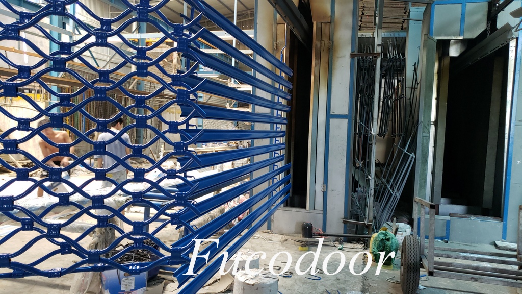  12:16 Cửa cuốn mắt võng tại Điện Máy Xanh, Sản xuất cửa cuốn Mắt Võng, nhà máy sản xuất cửa cuốn mắt cáo