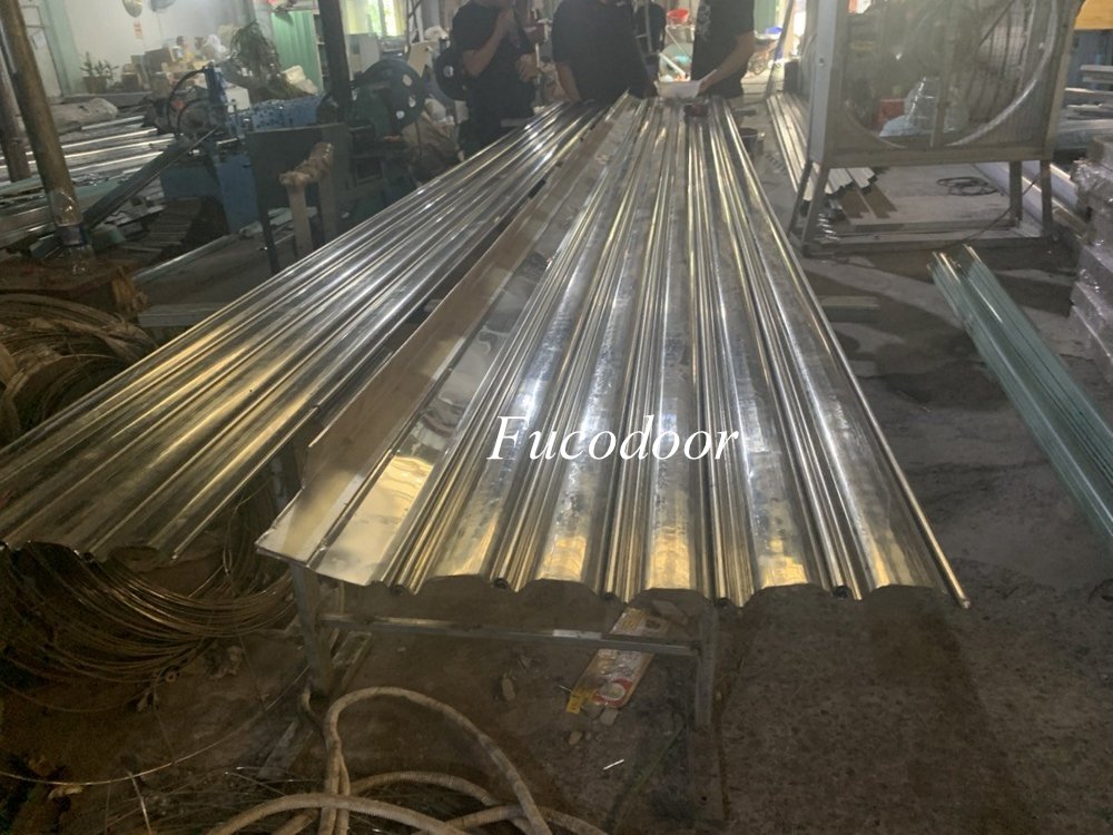 Các mẫu cửa nhà xưởng, cửa cuốn Siêu Trường Nhà Xưởng, cửa cuốn siêu trường loại ST100