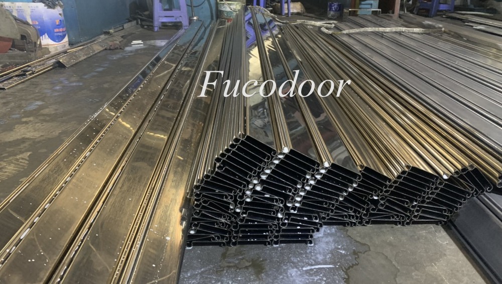 Thân cửa cuốn siêu trường INOX 304, độ dầy 0.8mm, 1mm, 1.2mm, 1.4mm, 1.5mm và 1,6