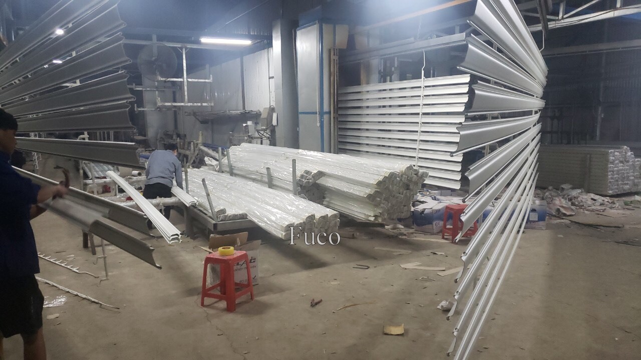 Cửa cuốn siêu trường ST100, Báo giá thi công lắp đặt cửa cuốn nhà xưởng công nghiệp