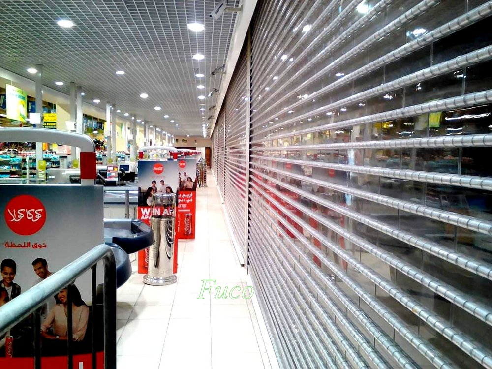 cửa cuốn trong suốt ống inox