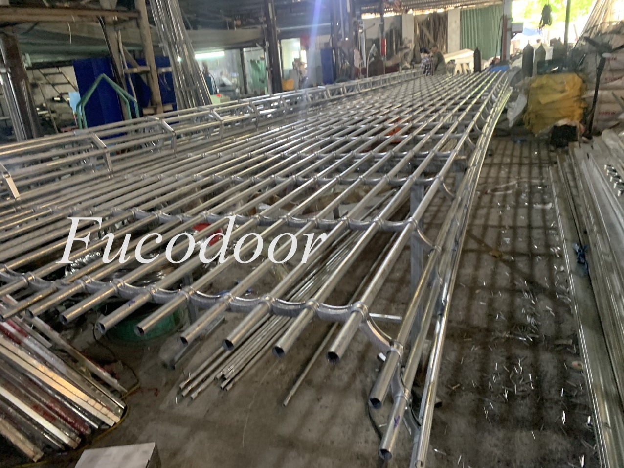 Cửa cuốn song ngang sơn tĩnh điện ống tròn phi 19 dầy 1.1ly