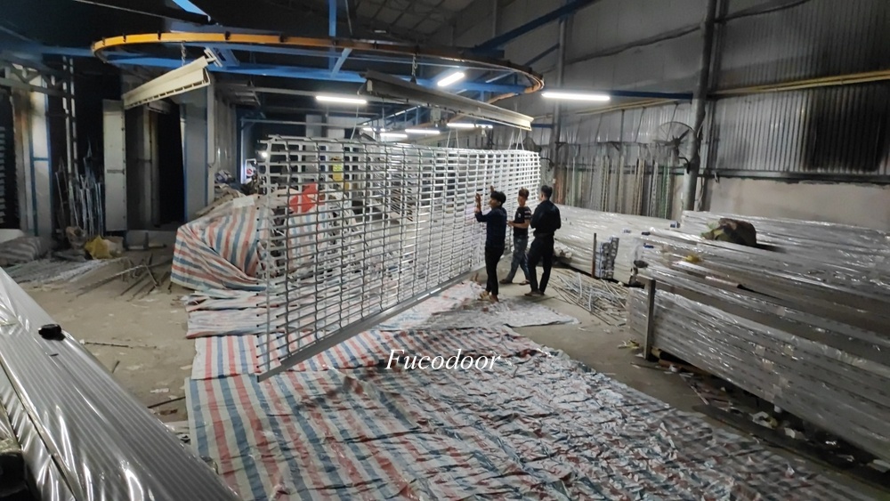 Cửa cuốn song ngang sơn tĩnh điện ống tròn phi 19 dầy 1.1ly